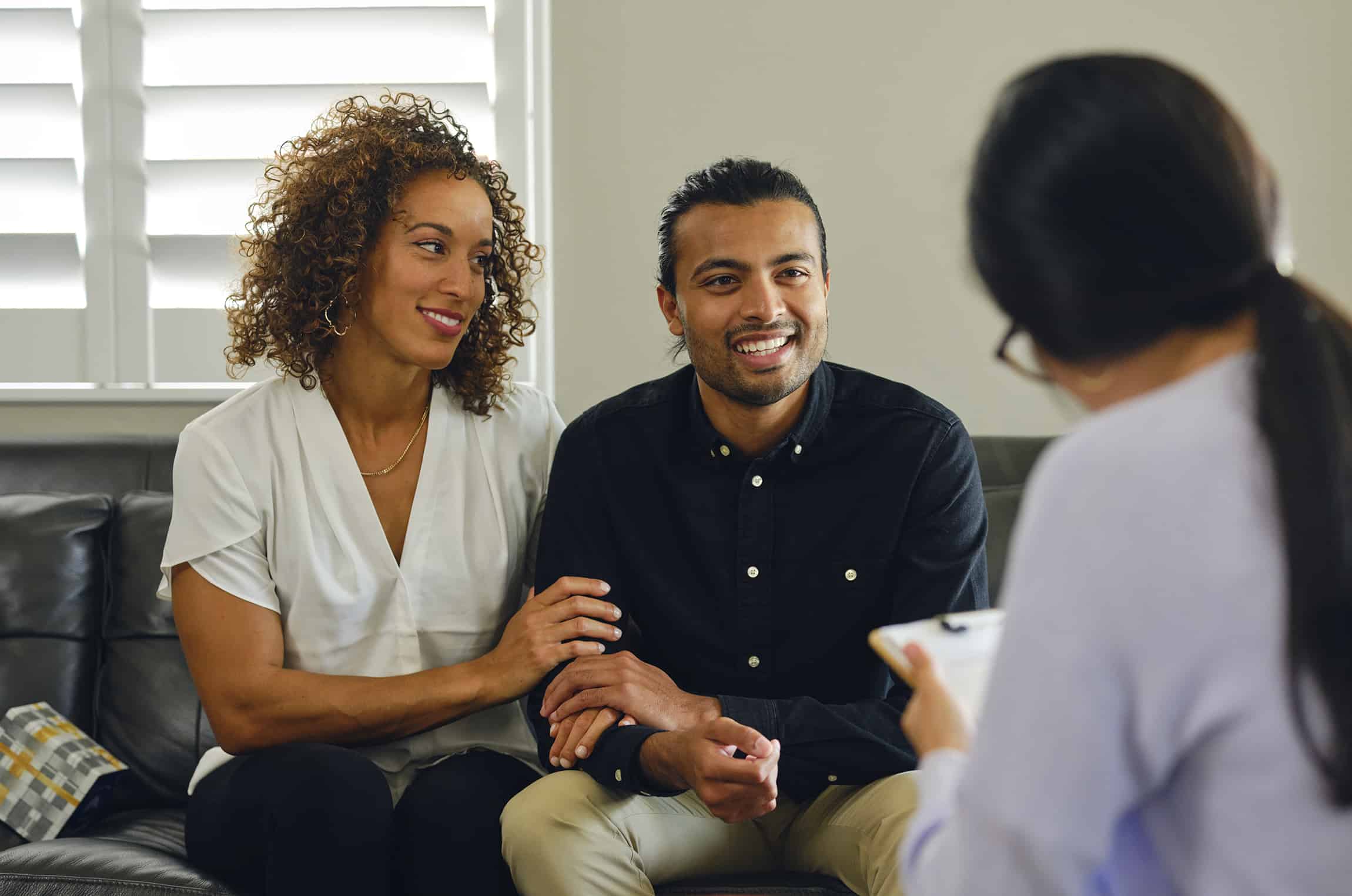 young couple with counselor