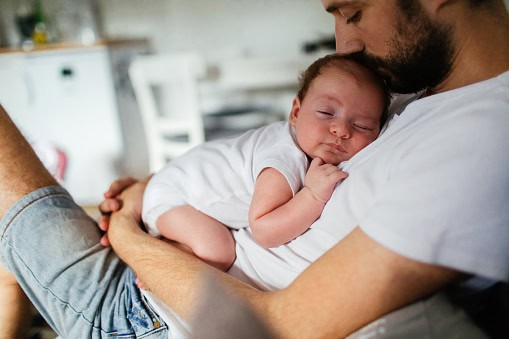 dad with baby attending flourish program